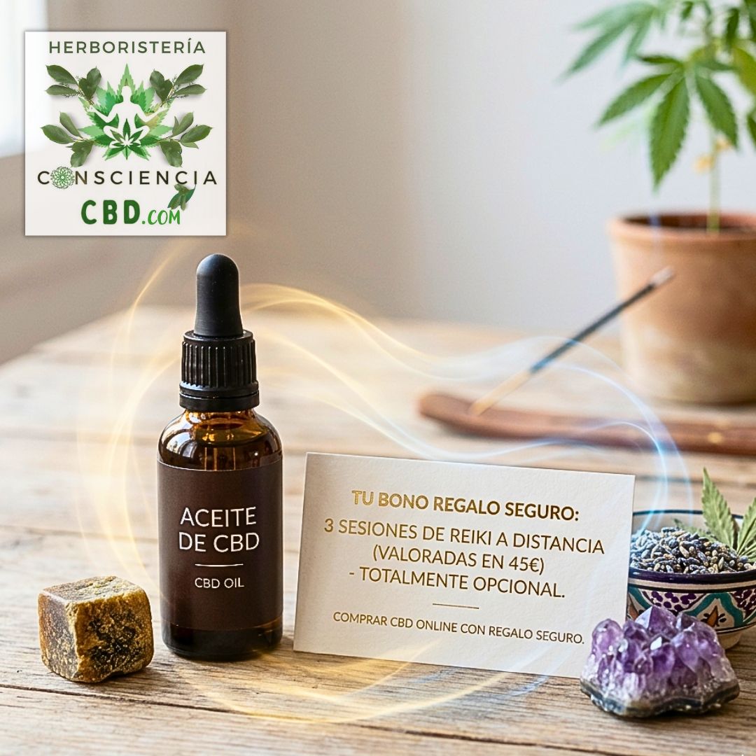 Aceite de CBD y Resina Hash Natural en una Mesa de Madera con un Folleto de Reiki Gratis.